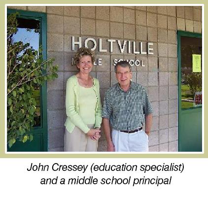 John Cressey (education specialist) and a middle school principal 