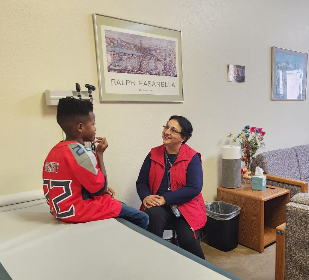 a doctor meeting with a student