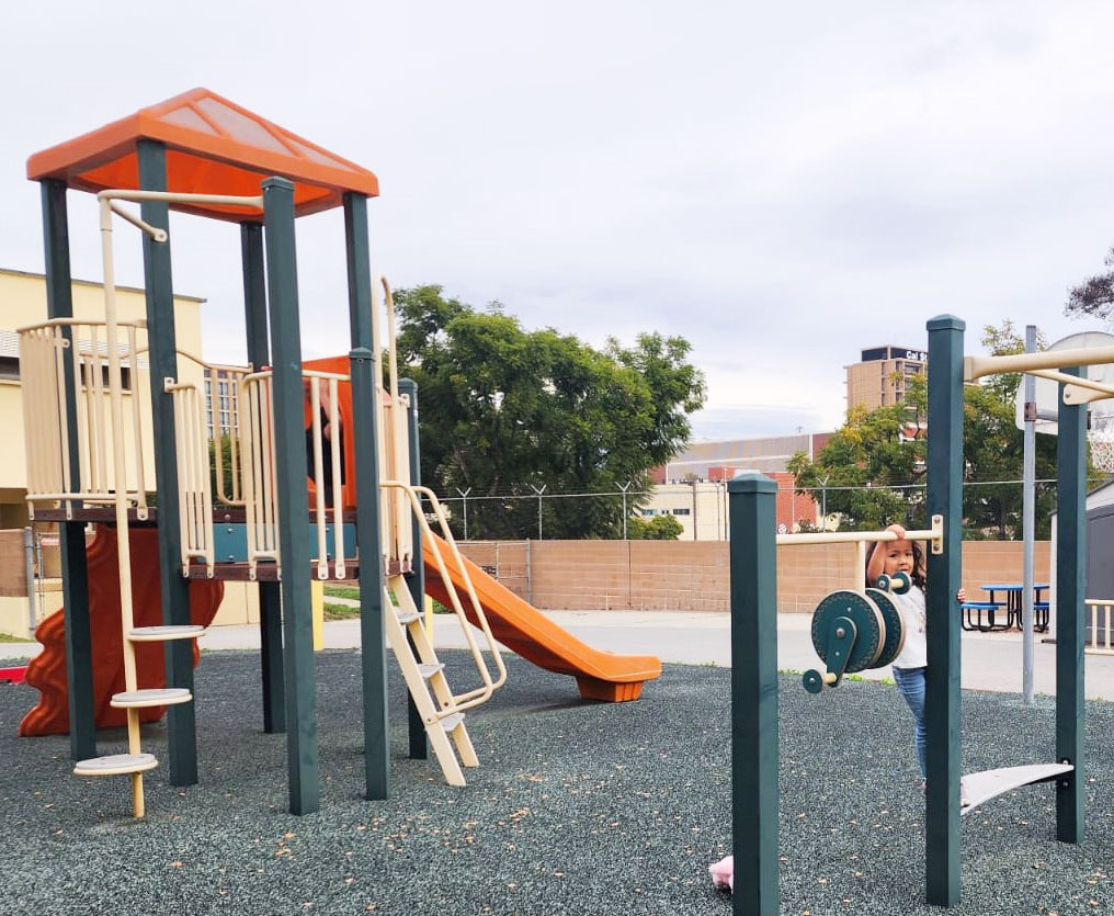 a student playing outside on the playground